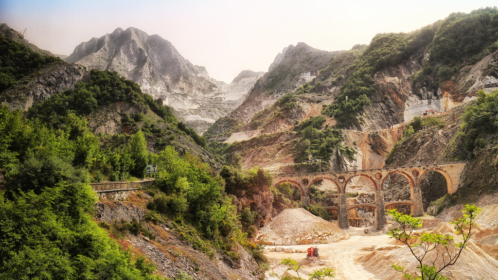 Marble quarry terraces cut into a mountainside in Carrara, Italy