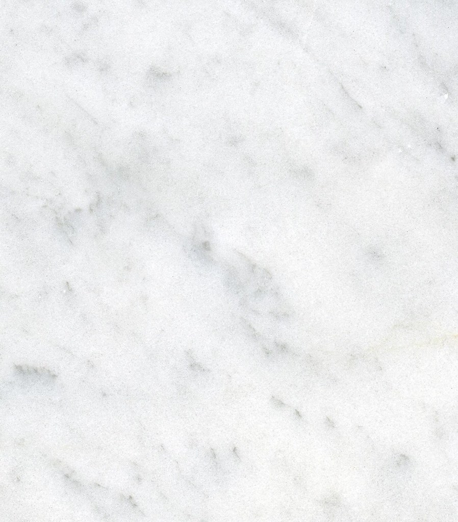 Close-up of white Carrara marble with fine grey veining